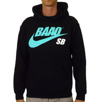 image of a man wearing a black pullover hoodie on a white background. hoodie has a full chest print above the pouch pocket in teal that says B A O O with a Nike Swoosh below and the letters S B in white on the right.