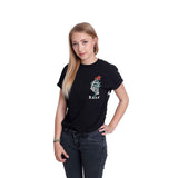 image of a blonde white woman with her hand on her hip wearing jeans and a black tee shirt on a white background. the tee has a small chest print on the right of a skeleton hand holding a red rose with the letters B A O O below